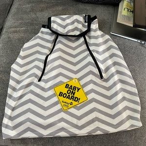 Car seat cover and baby on board sign